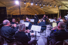 Behind the scenes view of the Melody Masters Big Band, Big Tent venue, Rochester International Jazz Festival, June 25, 2022. Photo by Don Ver Ploeg for Rochester International Jazz Festival