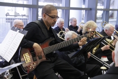 Chris N., electric bass, performing at Welcome Home Honor Flight performance on April 7, 2018, at ROC International Airport . Photo by Patricia Elliott.