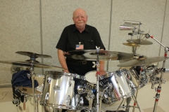 John L. with drum set at Perinton Parks & Recreation Dinner Dance. 2016. Photo by Patricia Elliott.